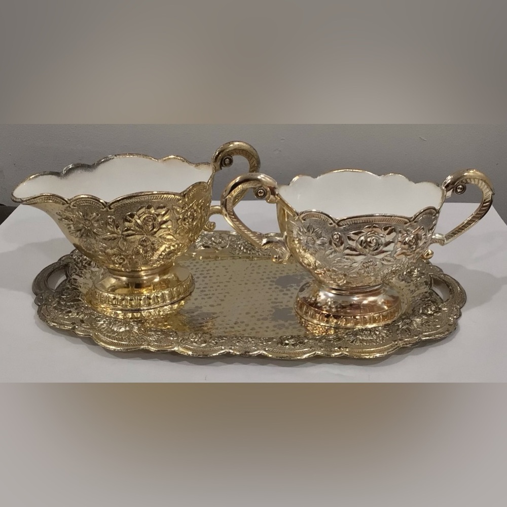 VINTAGE AND ORNATE PLATED SUGAR, CREAMER AND TRAY
